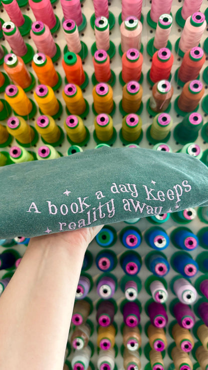 A Book a Day Keeps Reality Away Tee